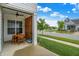 Covered patio featuring a ceiling fan, wooden privacy wall, and an outdoor dining set at 15116 Fenchurch Dr, Westfield, IN 46074