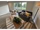 Spacious living room filled with natural light, featuring comfortable seating and a decorative coffee table at 1718 South Dr, Columbus, IN 47203
