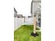 Landscaped backyard with white fence and hammock at 1880 Explorer Ct, Franklin, IN 46131
