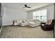 Bright living room with neutral color palette, cozy furniture, and ample natural light at 1880 Explorer Ct, Franklin, IN 46131