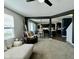 Open-concept living area showcases seamless flow to the kitchen and backyard access at 1880 Explorer Ct, Franklin, IN 46131