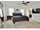 Serene main bedroom with neutral tones, large windows, and ensuite bathroom access at 1880 Explorer Ct, Franklin, IN 46131