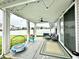 Covered patio with a ceiling fan, comfortable seating, and play area at 1880 Explorer Ct, Franklin, IN 46131