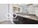 Beautiful bathroom with dual sinks, granite countertops, and wood cabinets at 19175 English Lake Ln, Noblesville, IN 46062