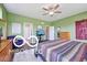 Cozy bedroom features a ceiling fan and two points of access at 19175 English Lake Ln, Noblesville, IN 46062
