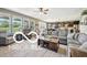 Comfortable living room with large windows, neutral tones, and an open concept design at 19175 English Lake Ln, Noblesville, IN 46062