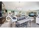 Open concept living space featuring a dining area, kitchen, and comfortable seating at 19175 English Lake Ln, Noblesville, IN 46062