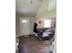 Open-concept living room with hardwood floors, neutral paint, and ample natural light at 1931 E 68Th St, Indianapolis, IN 46220
