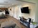 Spacious living room that flows into a kitchen featuring an open floor plan and modern design at 1931 E 68Th St, Indianapolis, IN 46220