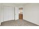 Bedroom featuring a closet and doorway to the kitchen space at 19584 Atwater Ave, Sheridan, IN 46069