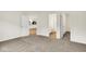 View of the kitchen and bath from a carpeted bedroom with neutral paint at 19584 Atwater Ave, Sheridan, IN 46069