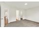 A secondary bedroom featuring a carpeted floor, large window and an open closet at 19584 Atwater Ave, Sheridan, IN 46069