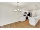 Modern kitchen featuring white cabinets, stainless steel appliances, and an island at 19584 Atwater Ave, Sheridan, IN 46069