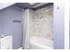 Updated bathroom featuring a tiled shower and new fixtures, providing a spa-like feel at 2215 S Delaware St, Indianapolis, IN 46225