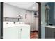 Convenient laundry room with modern washer and dryer, offering a functional space at 2215 S Delaware St, Indianapolis, IN 46225