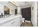 The bathroom boasts double sinks, and a shower-tub combo, with modern fixtures, and stylish decor at 2258 Bridlewood Dr, Franklin, IN 46131