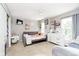 Inviting bedroom with gray walls, carpeted floors, and a comfortable daybed, offering a cozy and relaxing space at 2258 Bridlewood Dr, Franklin, IN 46131