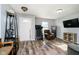 Inviting living room with hard surface floors, natural light, and home entertainment area at 2258 Bridlewood Dr, Franklin, IN 46131