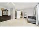 The main bedroom provides carpeted floors, a dresser, and access to a bathroom and closet space at 2258 Bridlewood Dr, Franklin, IN 46131