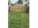 Backyard with a brand new wood fence at 23 S Holmes Ave, Indianapolis, IN 46222