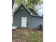 Outside the home shows a detached gray garage at 23 S Holmes Ave, Indianapolis, IN 46222