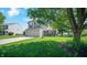 Charming two-story home with well-maintained lawn, attached garage, and beautiful curb appeal at 237 Broadmoor Bnd, Pittsboro, IN 46167