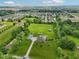 Wide aerial shot showcasing the property with lush grounds and the neighborhood beyond at 2825 S State Road 267, Plainfield, IN 46168