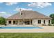 Gorgeous home featuring a sparkling backyard pool perfect for outdoor relaxation and entertainment at 2825 S State Road 267, Plainfield, IN 46168
