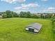 This property features a large barn with ample space and functionality, set on a sprawling green field at 2825 S State Road 267, Plainfield, IN 46168