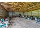 Rustic barn interior with wooden beams, metal walls and dirt floor, ideal for storage or agricultural purposes at 2825 S State Road 267, Plainfield, IN 46168