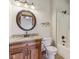 Bathroom with a vanity, granite countertop, toilet, and a shower and tub combo at 2825 S State Road 267, Plainfield, IN 46168