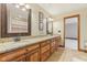Bathroom featuring double vanity, granite countertops, wood cabinetry, and tile floors at 2825 S State Road 267, Plainfield, IN 46168