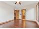 Bedroom features hardwood floors and easy access to a staircase and bathroom at 2825 S State Road 267, Plainfield, IN 46168