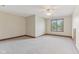 Bedroom featuring soft carpet, neutral walls and trim, and a ceiling fan at 2825 S State Road 267, Plainfield, IN 46168