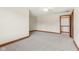 Bedroom featuring soft carpet, neutral walls and trim, and closet at 2825 S State Road 267, Plainfield, IN 46168