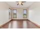 Bedroom featuring hardwood floors and two windows overlooking a beautiful landscape at 2825 S State Road 267, Plainfield, IN 46168