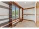 Custom closet with a window, bench and ample shelving at 2825 S State Road 267, Plainfield, IN 46168