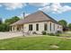 Well-maintained home with charming exterior, spacious lawn, and manicured landscaping at 2825 S State Road 267, Plainfield, IN 46168
