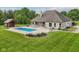 Outdoor view showing back of home, patio, gazebo, and pool; a perfect space for entertainment at 2825 S State Road 267, Plainfield, IN 46168