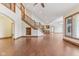 Spacious living room featuring hardwood floors, high ceilings, staircase, and an open layout at 2825 S State Road 267, Plainfield, IN 46168