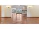 Open-concept living space featuring a stone fireplace and beautiful hardwood floors at 2825 S State Road 267, Plainfield, IN 46168