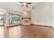 Bright living space with hardwood floors, a fireplace, and plenty of natural light at 2825 S State Road 267, Plainfield, IN 46168