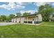 Functional outbuilding with multiple garage doors, providing ample storage or workspace at 2825 S State Road 267, Plainfield, IN 46168