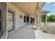 Elegant covered patio with detailed brickwork, providing a seamless transition between indoor and outdoor living at 2825 S State Road 267, Plainfield, IN 46168