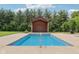 The pool house stands as a charming backyard amenity, set perfectly poolside at 2825 S State Road 267, Plainfield, IN 46168