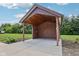 Close up of the pool house featuring a stylish design and comfortable outdoor space at 2825 S State Road 267, Plainfield, IN 46168
