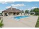 Beautiful in-ground swimming pool with a pool house and additional garage in a large manicured yard at 2825 S State Road 267, Plainfield, IN 46168