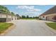 Wide view of the property highlighting the home, outbuilding, and gravel drive at 2825 S State Road 267, Plainfield, IN 46168