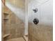 Walk in shower featuring built in shelving and bronze fixtures at 2825 S State Road 267, Plainfield, IN 46168