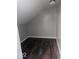 Attic featuring wood floors and clean walls at 2968 N Arsenal Ave, Indianapolis, IN 46218